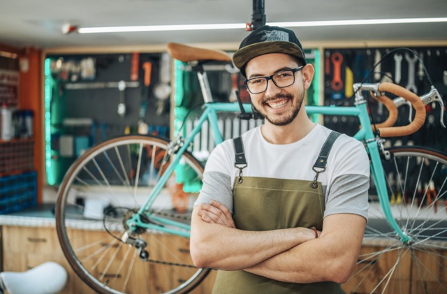 Portrait of a bike shop owner.